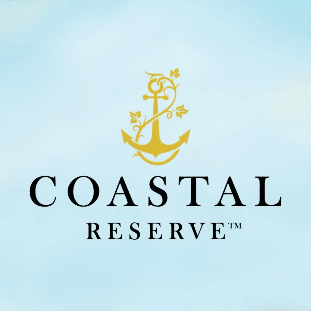 Gold anchor entwined with leafy vine above the words “Coastal Reserve™” on a soft blue background.
